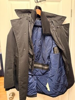 Black coat w/ quilted blue interior